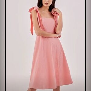 Elegant Coral Midi Dress with Bow Straps